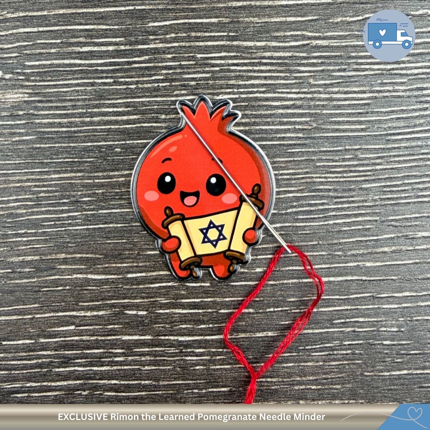 Cute cartoon pomegranate character with a Torah on a cross-stitch background