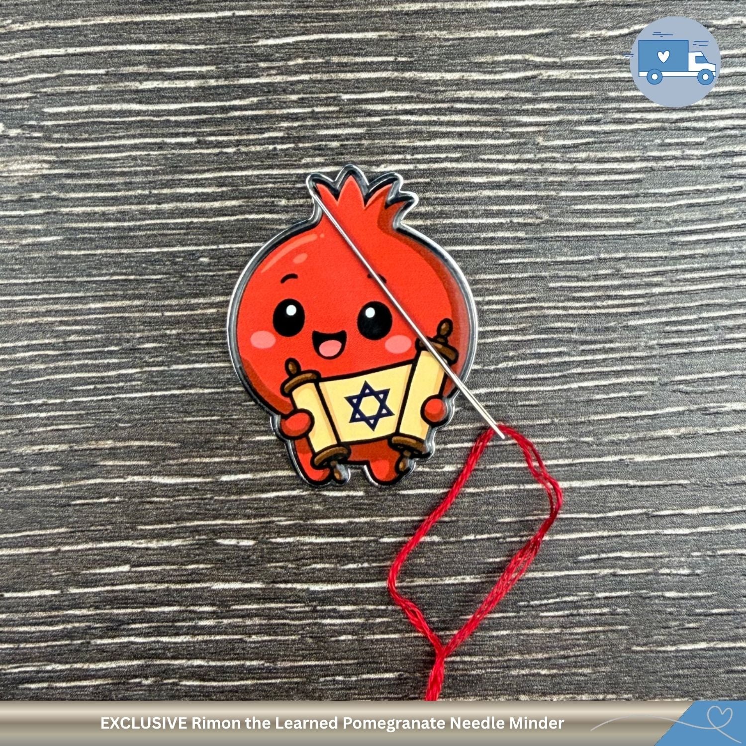 Cute cartoon pomegranate character with a Torah on a cross-stitch background