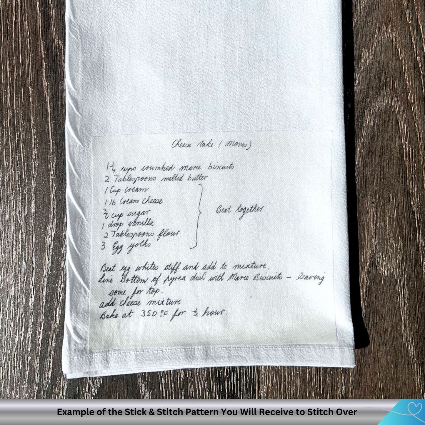 White towel with stick and stitch pattern with recipe on a wooden surface