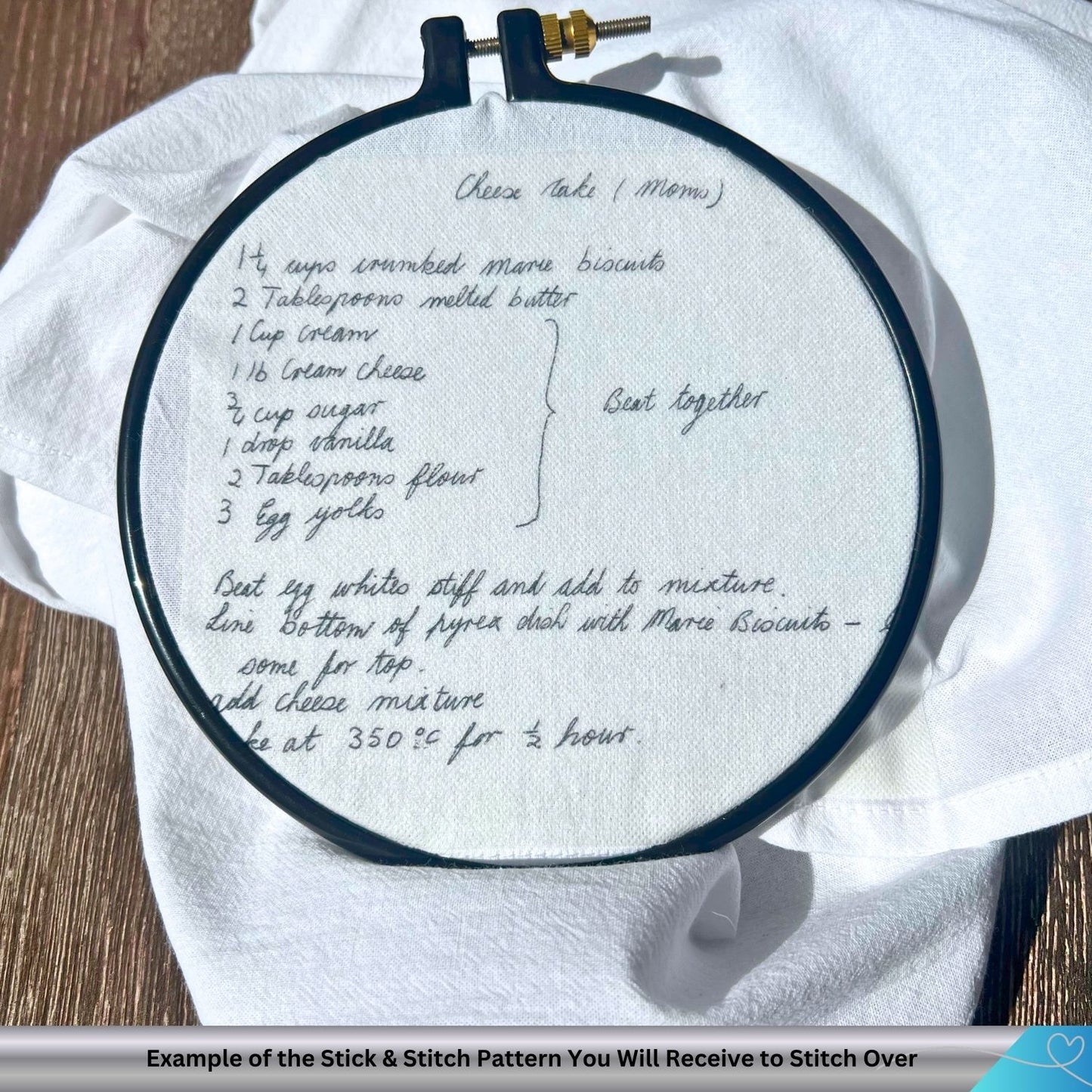 Embroidery hoop with handwritten recipe on a white fabric background
