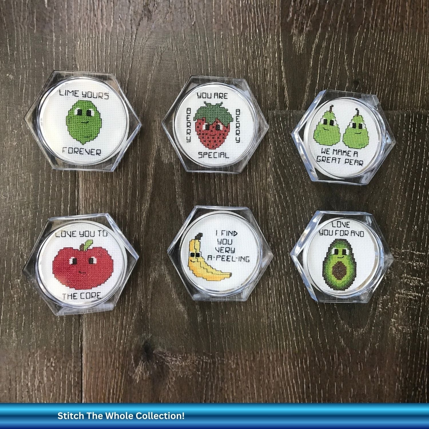 Hexagonal embroidered coasters with fruit designs and funny puns on a wooden surface.