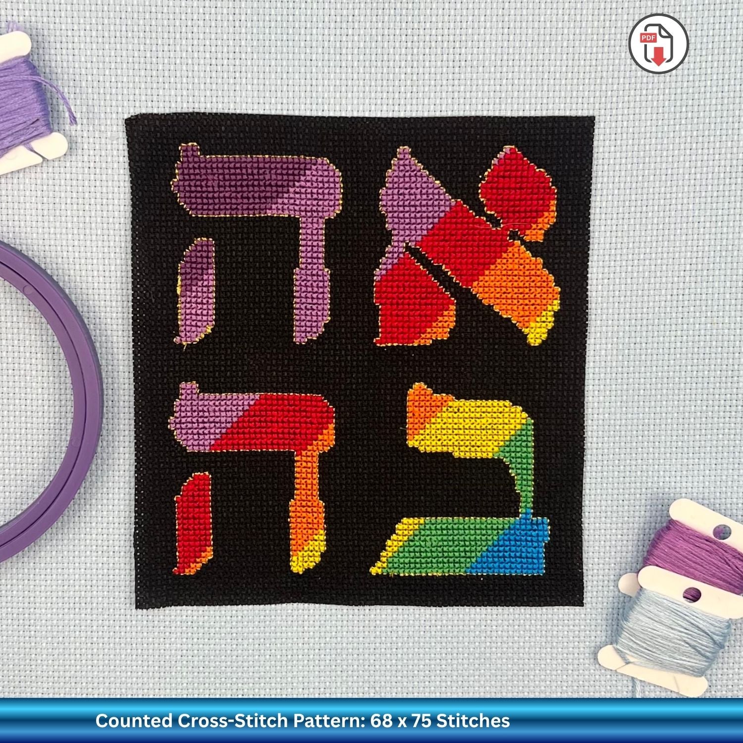 Jewish cross-stitched word Ahava in Hebrew meaning Love on black Aida fabric against a blue fanfic background